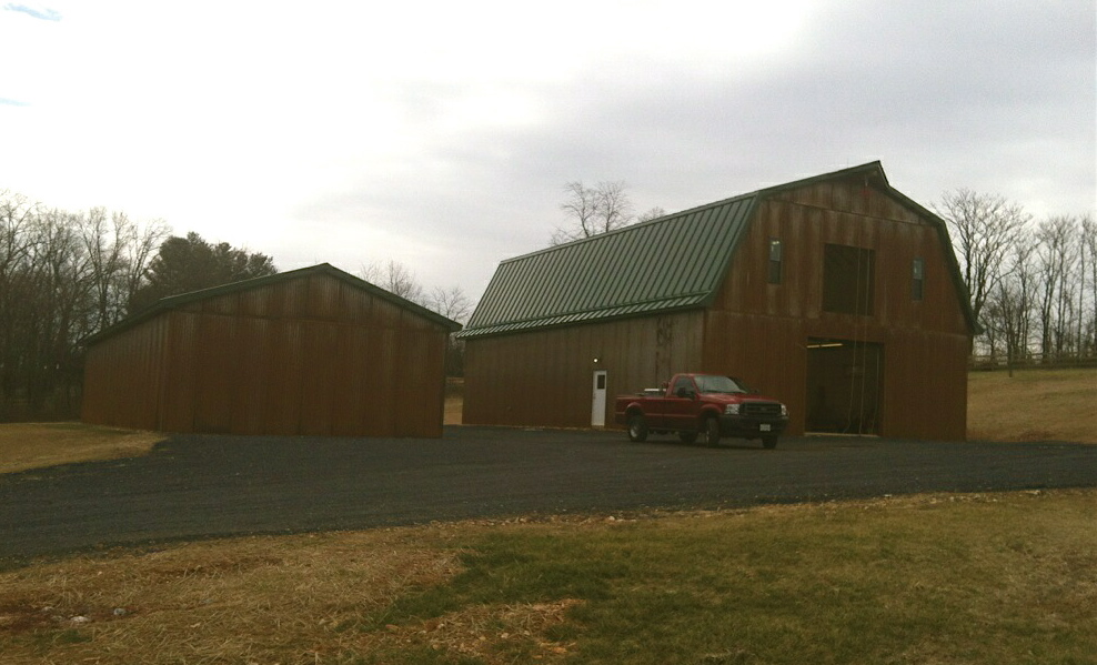 Completed 40x60 two-story barn and 24 x 60 open front shed