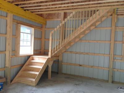 Typical full-size stair case for convenient access to attic or 2nd Floor