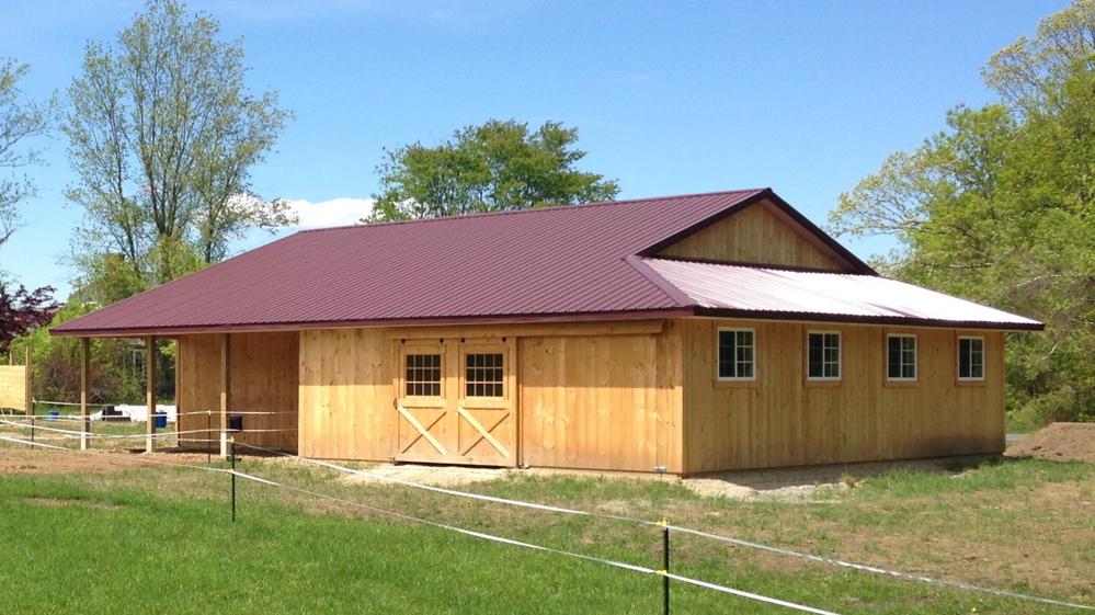 Horse barn measures 40X50 with an enclosed lean-to and open porch